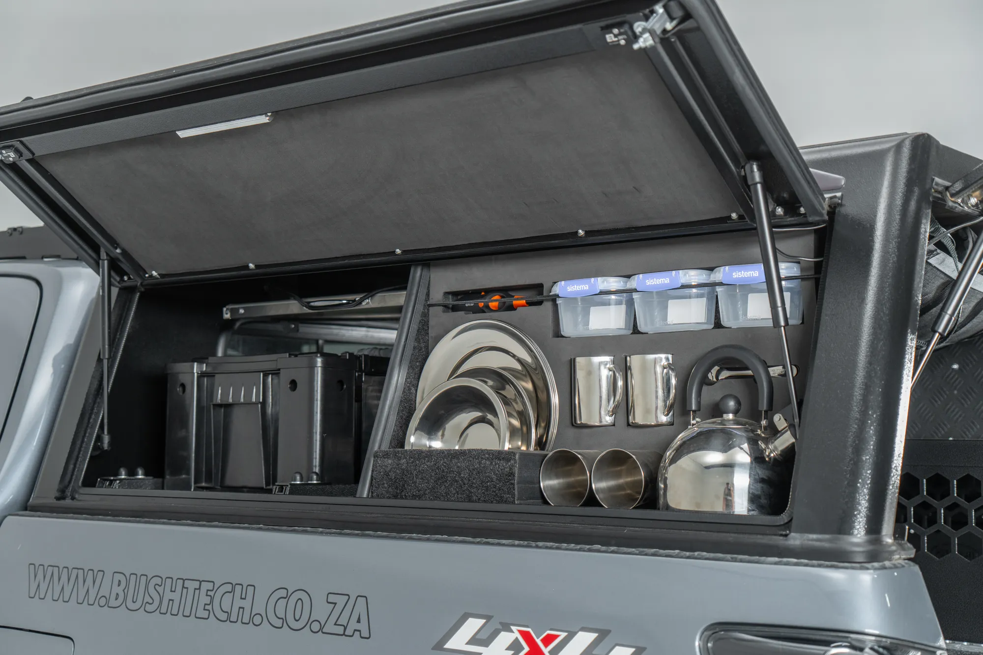 Inside a Bushtech canopy on a D-Max, one gullwing open