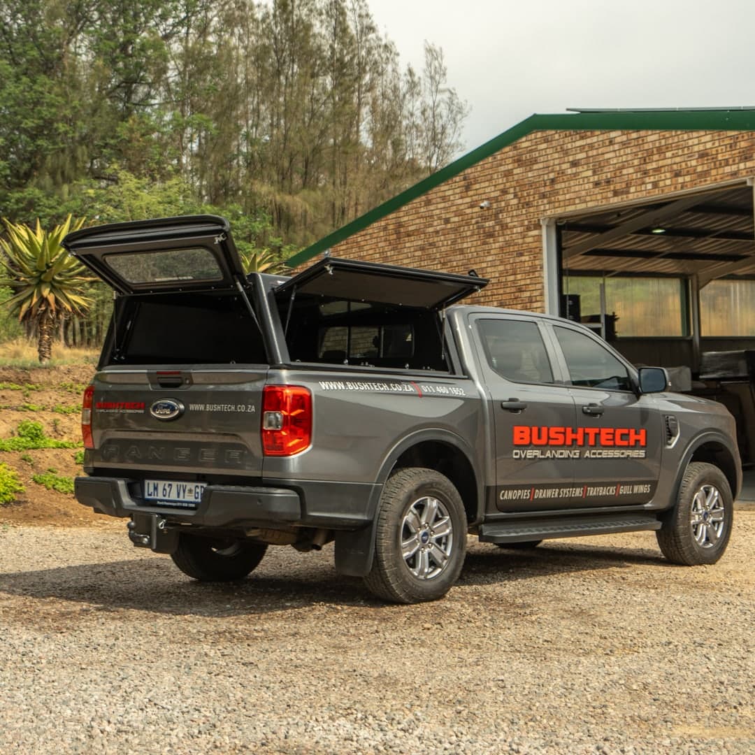 A Ford Ranger with a Bushtech canopy, one gullwing up