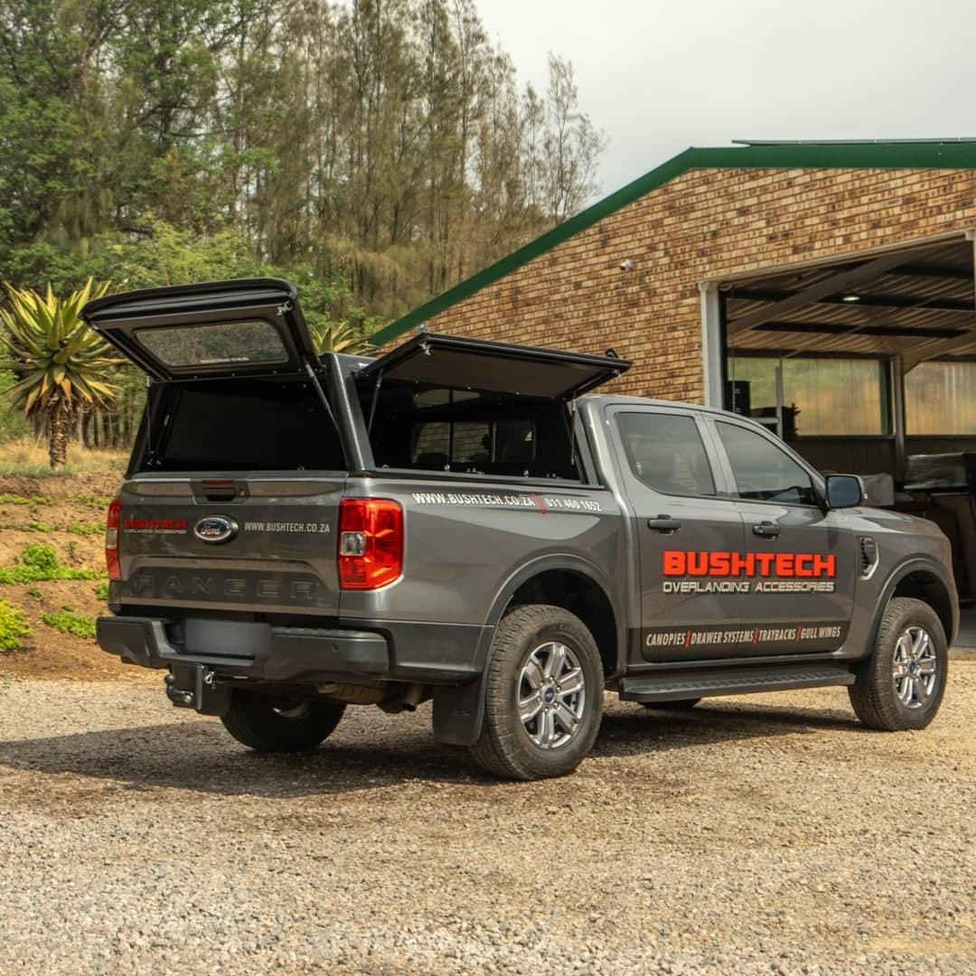 A Ford Ranger with a Bushtech canopy, one gullwing up