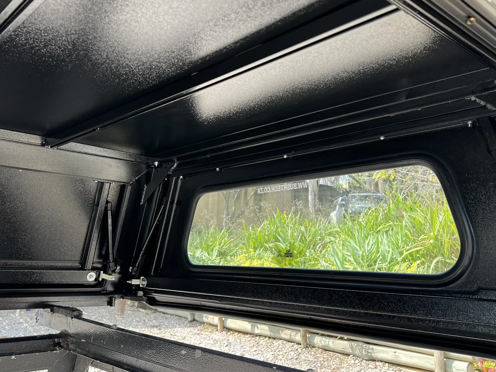 Inside the canopy: roof ribs, strut and window