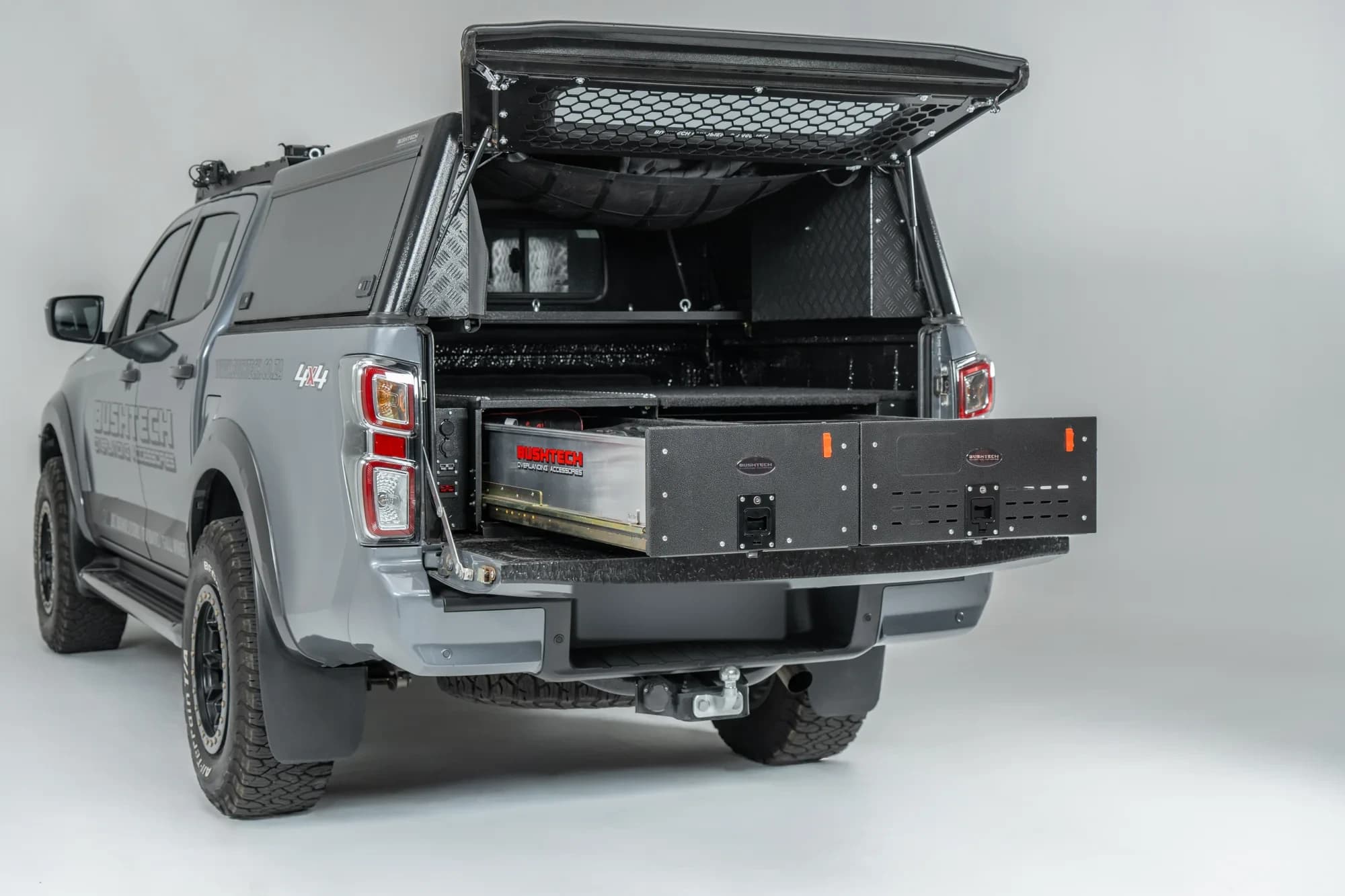 A D-Max with a Bushtech canopy and the drawer out