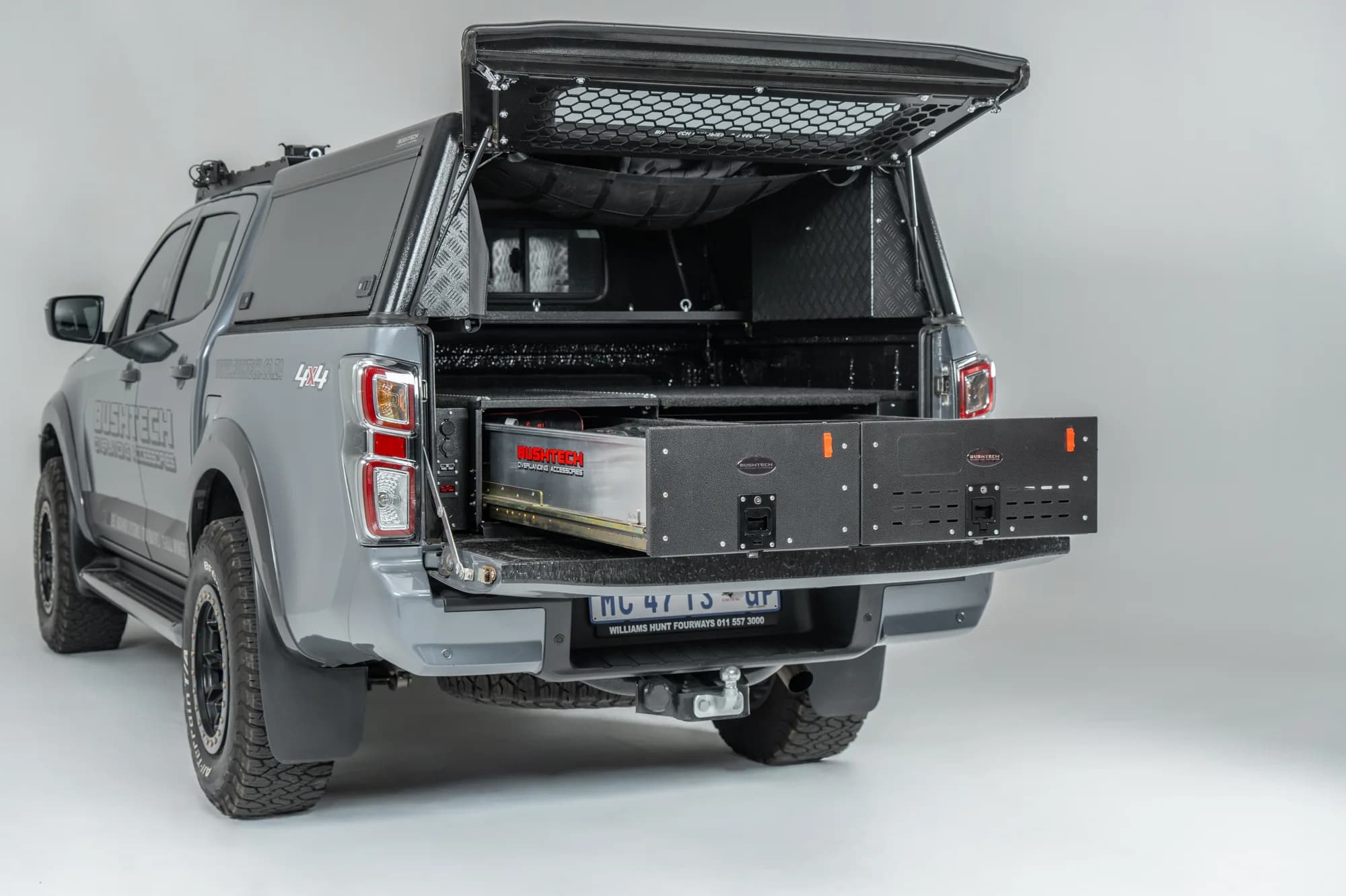 A D-Max with a Bushtech canopy and the drawer out